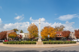 The Monument known as Chip surrounded by colorful autumn foliage in historic downtown Franklin, Tennessee.