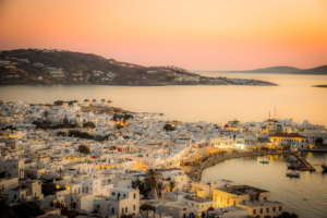 mykonos greece white buildings sunset aegean sea coastal village photography