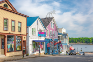 Colorful waterfront street scene in Bar Harbor Maine with harbor view