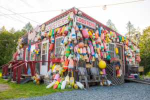 Colorful lobster buoys covering a seafood shack in Maine