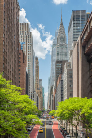 Vertical color view down 42nd Street in New York City with the Chrysler Building rising above Manhattan