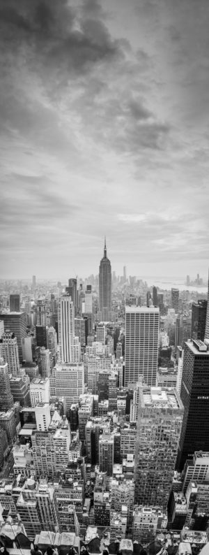 Black and white vertical panorama of Midtown Manhattan skyline with Empire State Building