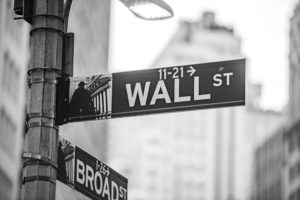 Black and white Wall Street sign in New York City financial district