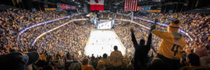 Crowded Nashville Predators hockey game inside Bridgestone Arena in Nashville Tennessee