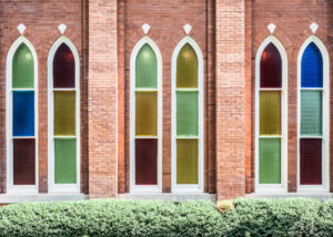 Colorful stained glass windows on the exterior of Ryman Auditorium in Nashville Tennessee