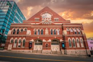 Ryman Auditorium in Nashville Tennessee at sunrise with dramatic clouds and warm sky