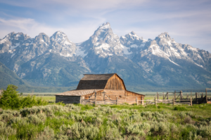 Historic Mormon Row barn with Grand Teton mountains in Wyoming
