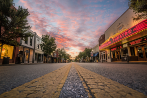 Historic downtown Franklin Tennessee Main Street at sunrise with Franklin Theatre marquee and colorful clouds